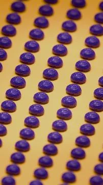 Close-up of purple 3D brain models arranged in repeating pattern on yellow .. Stock Photos