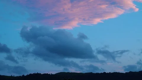 Close up of purple cloud in sky at sunset Stock Footage 260367425