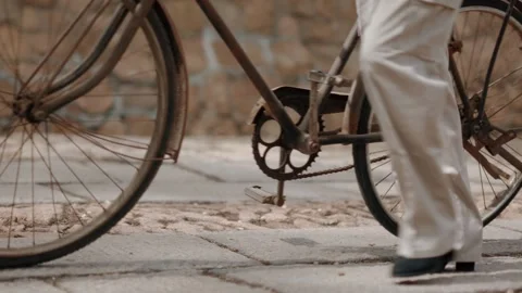 Close-up of pushing an old Chinese bicycle Stock Footage 273072489