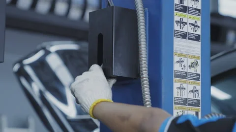 Close up put lever to lift down car 50fps Stock-Footage 246383164