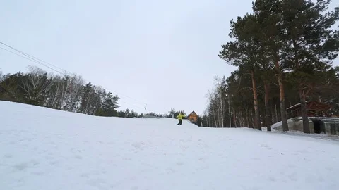 Close up to put a snowboard in the winter Stock-Footage 73673829