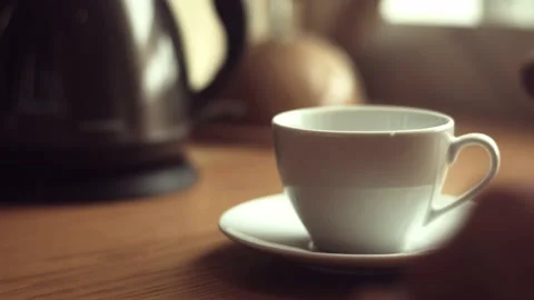 Close up. Put a tea bag into a cup. Pouring boiling water. Make tea. Stock Footage 156437849