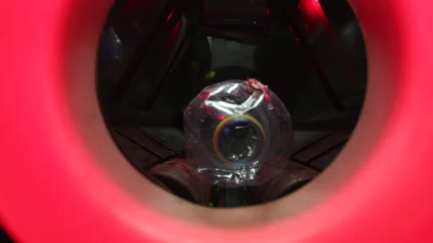 Close up putting and scanning plastic bottle in recycling bin Stock Footage 225401633