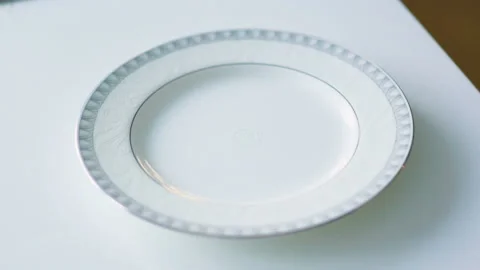 Close up of putting an apple crumble cake in a plate from oven. Kitchen, pastry Stock Footage 128587498