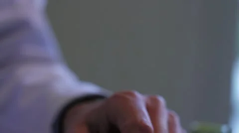 Close on putting on both rubber gloves Stock Footage 20447372