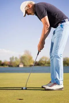 Close up of a putting golf player. Stock-Fotos
