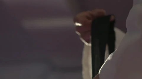 Close up of putting on punching wraps on hands in the gym Video stock 68080165