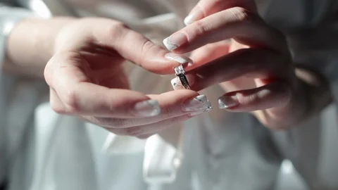 Close up putting on ring wedding Stock Footage 97816901