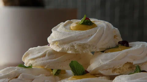 Close-up of a pyramid built of large swirled meringues 스톡 동영상 168182897