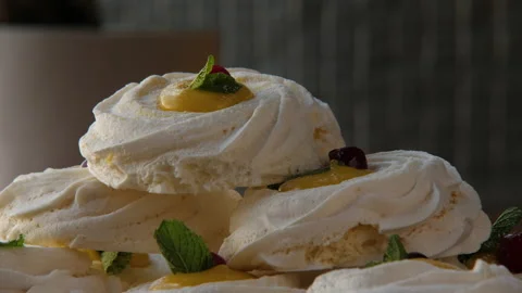 Close-up of a pyramid built of large swirled meringues 스톡 동영상 168183066