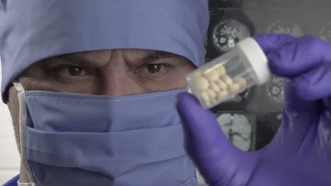 Close up. Quality Control Workers Examining Pills in Lab. Pharmaceutical lab Video stock 124335346