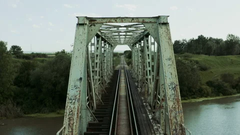 Close quarter flight through an old railway bridge Stock Footage 133158469