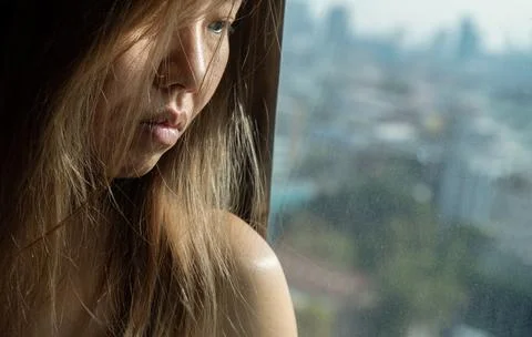 A close-up of quiet introspection, where the soft morning light brushes aga.. Stock Photos