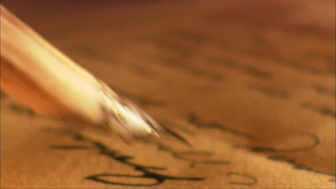 Close Up of Quill - writes document on parchment with ink Video stock 90130317