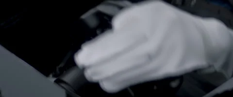 Close-up of a race car driver in a driving fast on a racing track, evening race Stock Footage 318946220