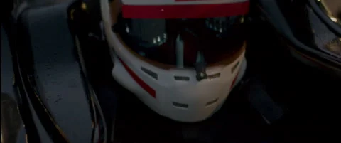 Close-up of a race car driver in a driving fast on a racing track, evening race Stock Footage 318946276