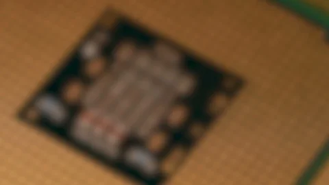 Close up with rack focus on CPU Chip Processor rotating on dolly. Stock-Footage 113737572