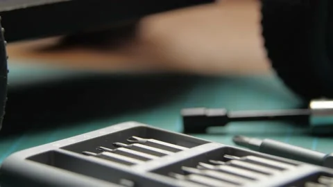 Close-up radio control model buggy car on cutting mat with screwdrivers 스톡 동영상 147426595