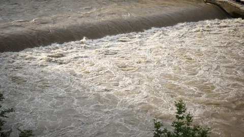 Close up of raging water of Tiber river at evening in Rome. Italy. Clear water Stock-Footage 105166246