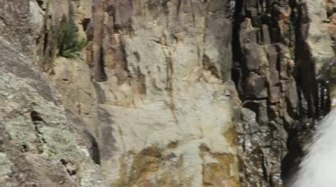 Close up of raging waterfall &amp; rock formations pan right Nethercote Falls, NSW 動画素材 11234719