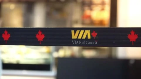 Close-up of VIA Rail Canada branded stanchion belt at a train station Stock Footage 340367784
