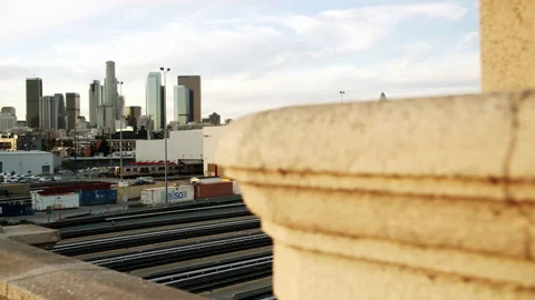 Close-Up Rail Yard Reveal With LA Skyline In Background Near 4th Street Brid Stock Footage 222011903