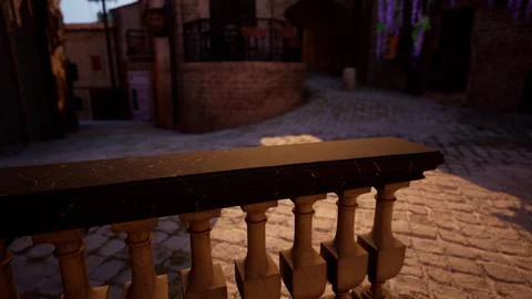 A close up of a railing with a brick building in the background Ilustración de archivo
