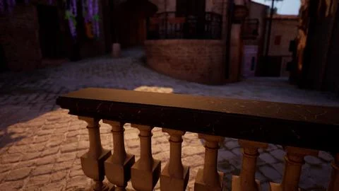 A close up of a railing with a brick building in the background Ilustración de archivo