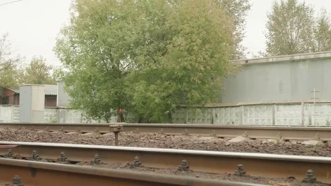Close up of rails and train moving on. Slow motion Stock Footage 82965852