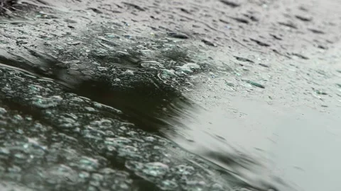 Close-up rain drops on glass surface Stock-Footage 249476690