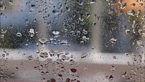 Close-up rain drops on window Stock Footage 162573739
