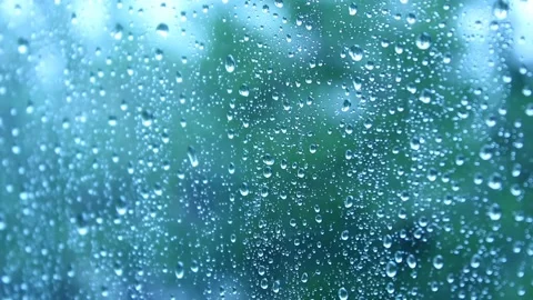 Close up rain drops on a window glass. Stock Footage 154448842