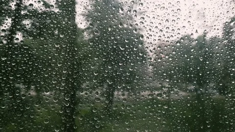 Close up rain drops on a window glass Stock Footage 157002139