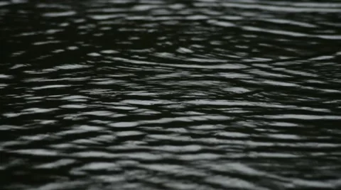 Close up of Rain falling on Lake Stock Footage 66995282