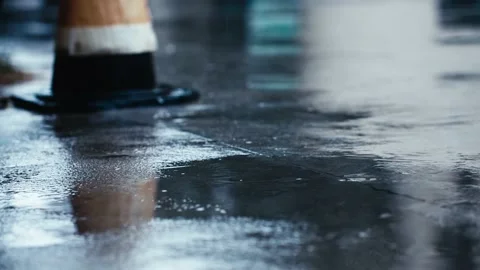 Close-up of rain on the ground during the autumn rainy season Stock Footage 228663296