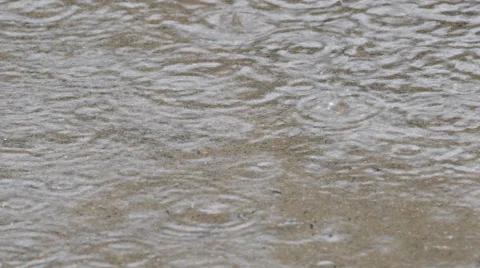 Close up of rain on a sidewalk Video stock 67522784