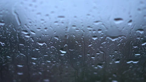 Close up rain on window Stock Footage 179966764