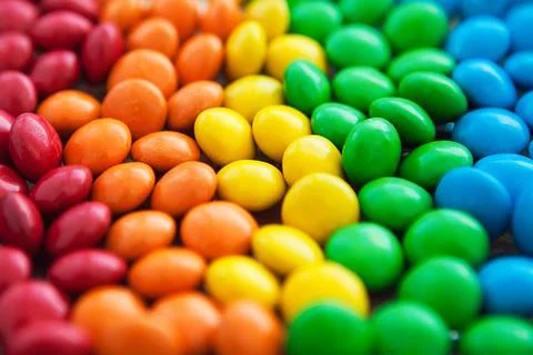 Close up of rainbow colored candy, sugar coated candies. Candy delicious swee Foto stock