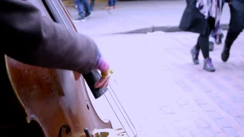 Close up of Rainbow Gloved Cello Player Playing 動画素材 83147352