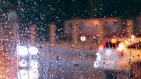 Close up of raindrops on car’s window Stock Footage 87990212