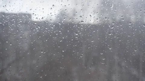 Close-up of raindrops on the glass Stock Footage 125951977