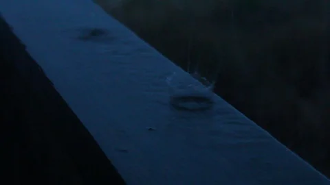 Close Up Raindrops On Railway By Ocean During Storm Stock Footage 106673709