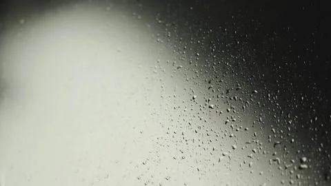 Close-up of raindrops running down glass or window. Close-up of fogged glass Stock Footage 318066021