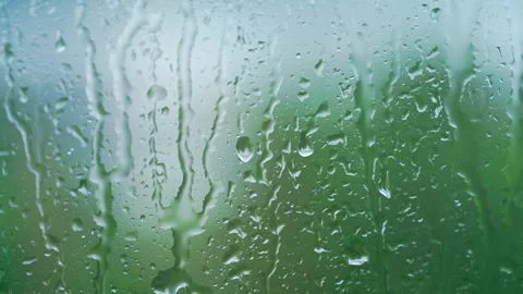 Close up of raindrops on the window. Seasonal showers. Stock Footage 262425552