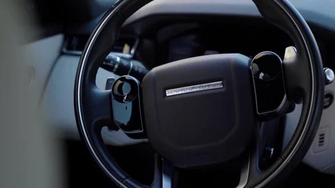 Close-up of the Range Rover Velar steering wheel. Stock Footage 254816146