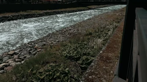 Close-up of the rapid flow of the Mzymta River from the side of the Tulip Inn Stock Footage 280368745