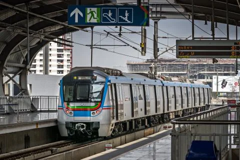 Close up of Rapid transit  metro train exiting Balanagar station in the morni Stock Photos
