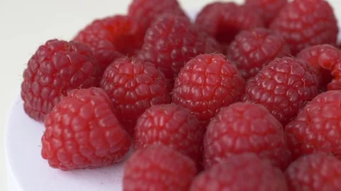 Close up raspberries rotating represent freshness and product quality for food Stock Footage 332874838