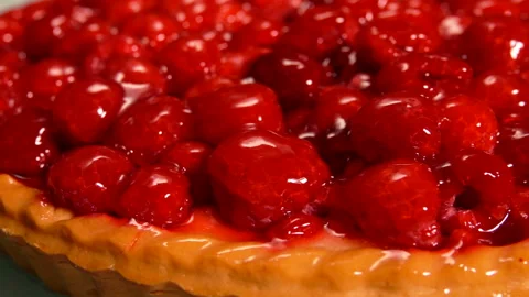 Close-up of raspberry Pie covered with jelly Stock Footage 104628349