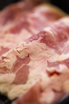 Close-Up of Raw Beef Strips in a Container at korean hotpot restaurant Stock Photos